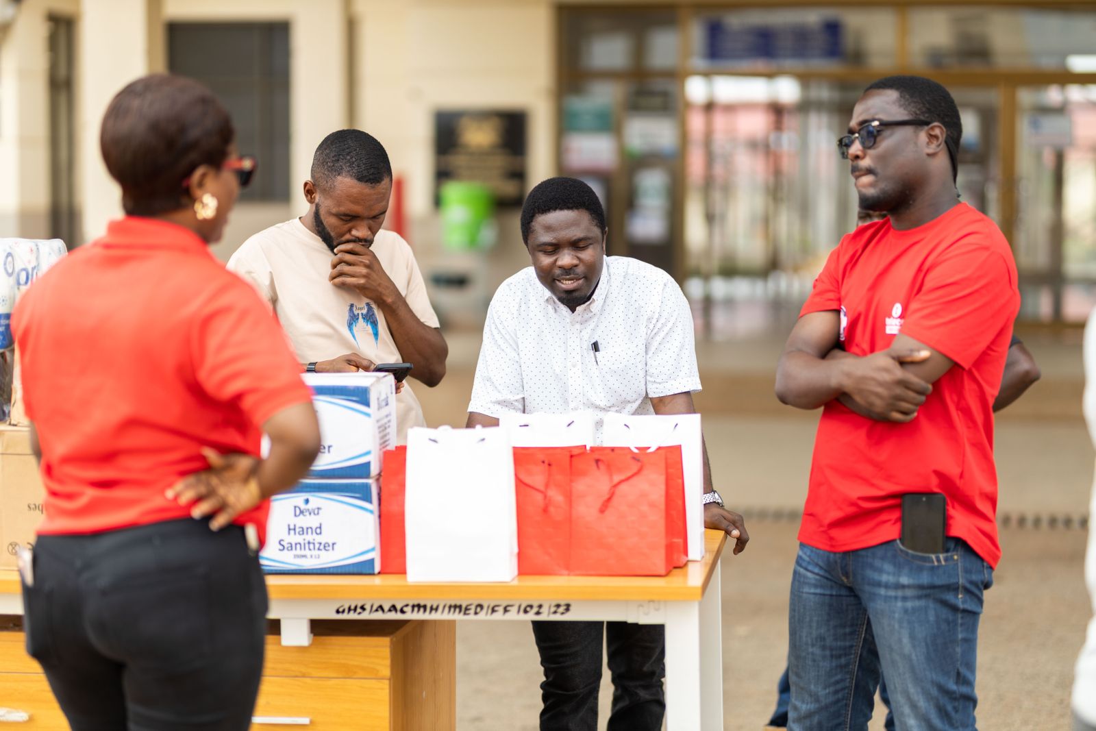 Volunteers sharing supplies at a community event