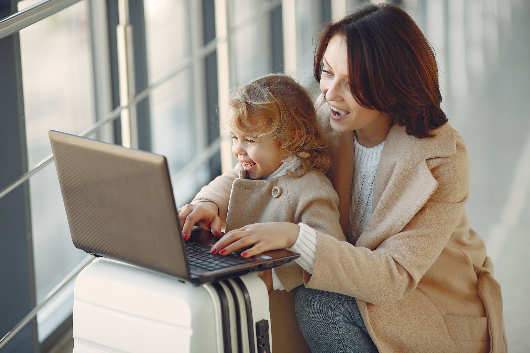 A mother and daughter preparing to travel