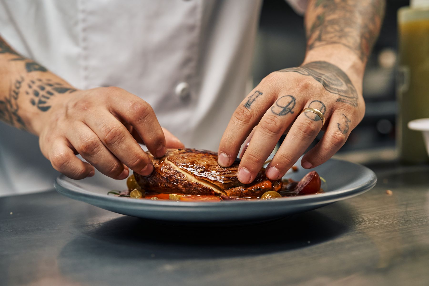 A chef plating a dish