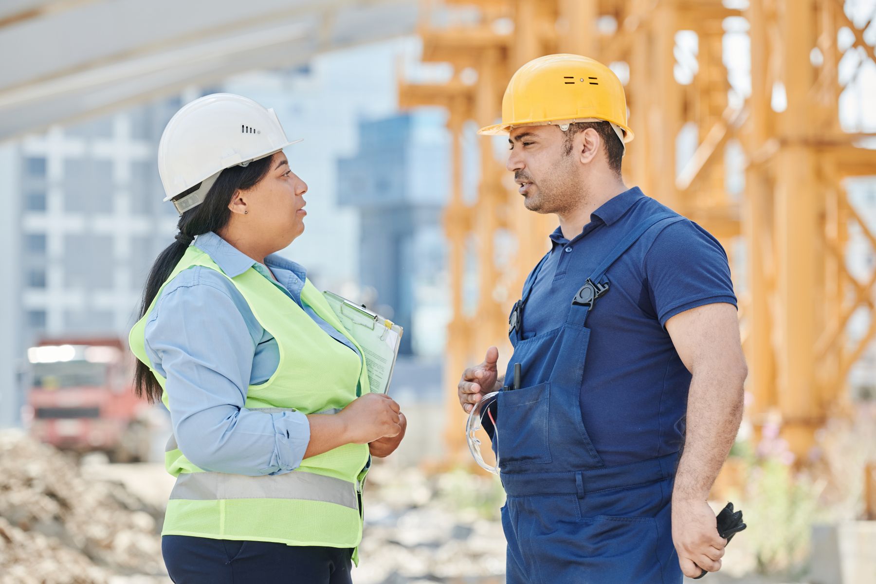 Engineers talking on a construction site