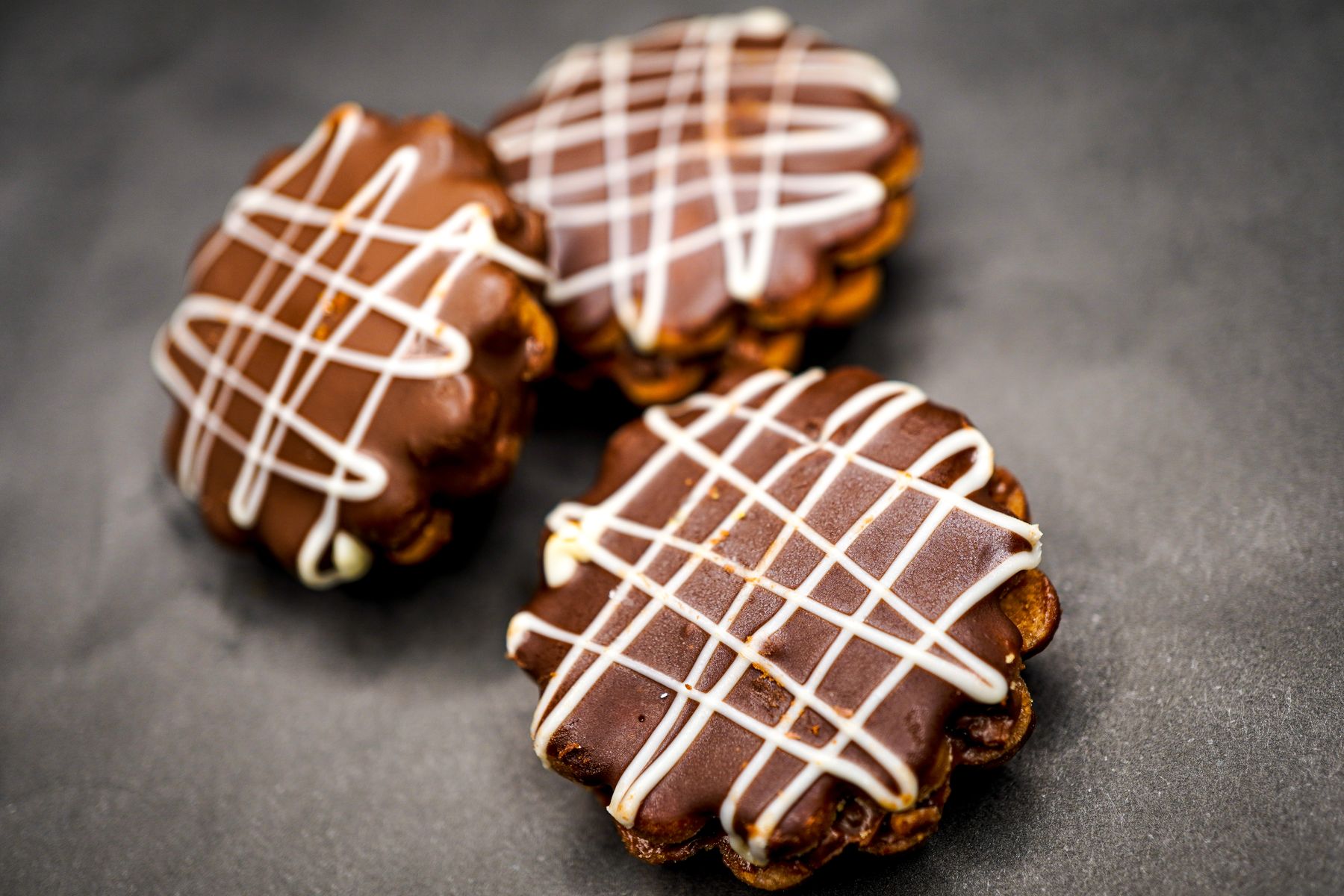 Chocolate cookies with white drizzle