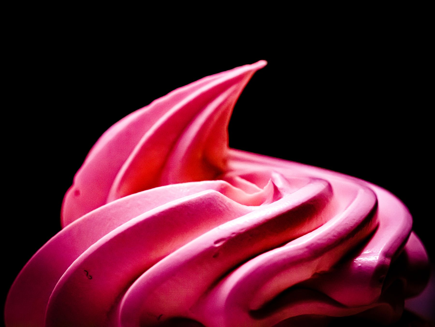 A pink frosting swirl