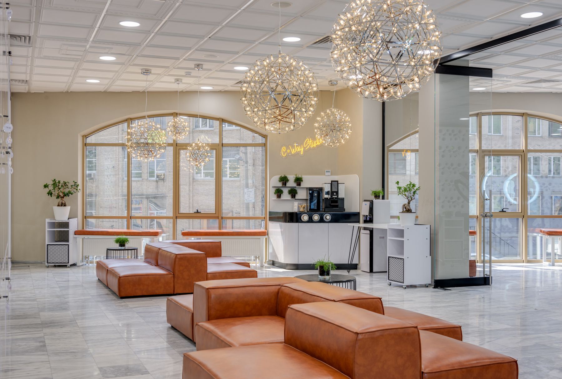 A bright lobby with leather sofas