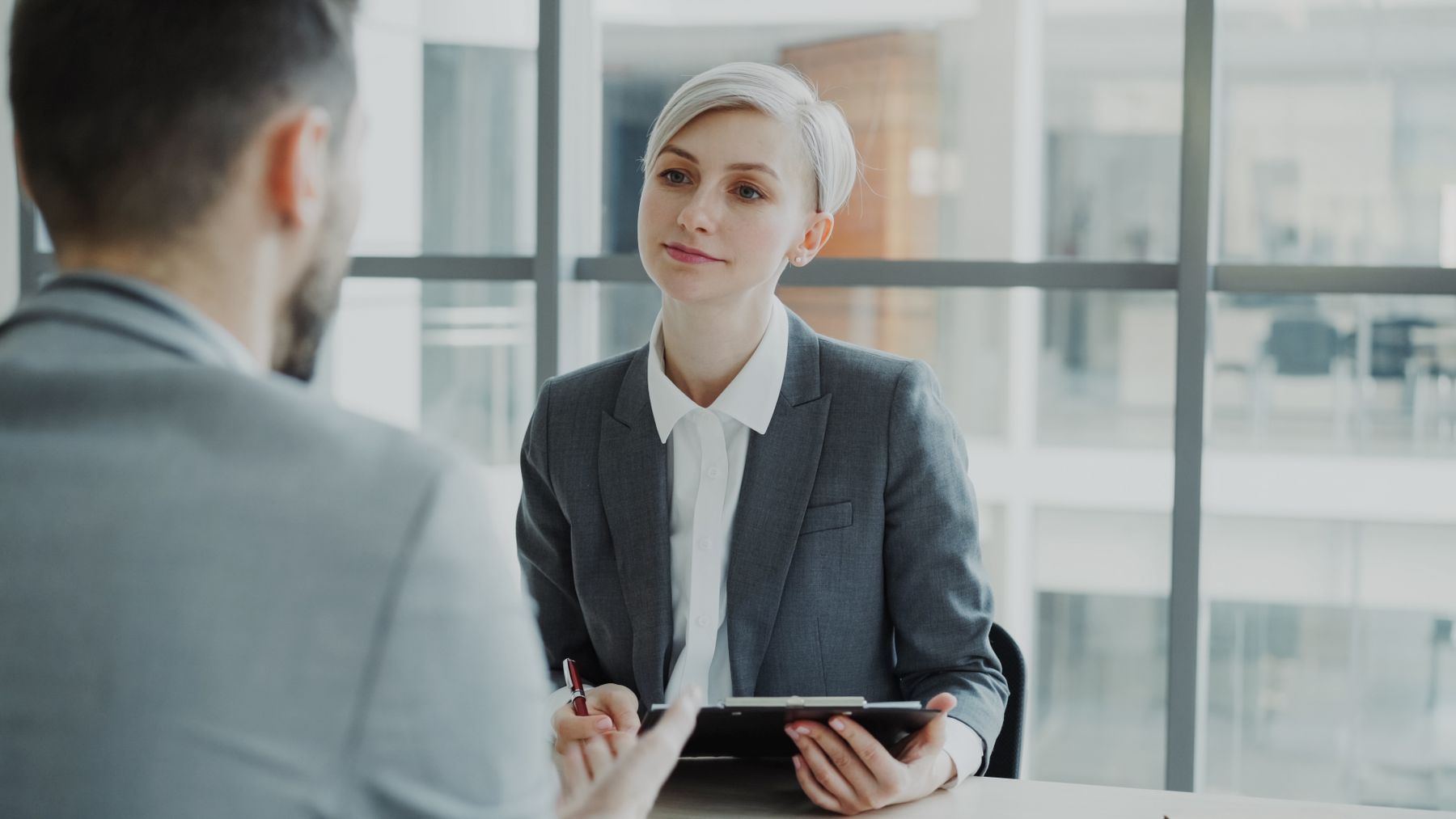 Two professionals discussing an opportunity